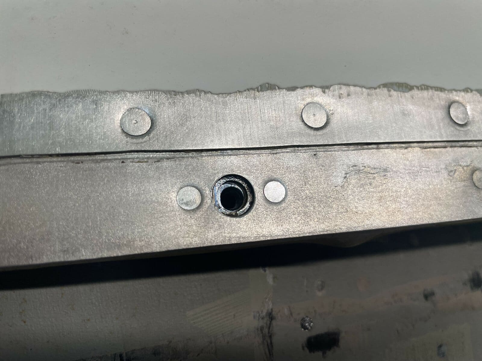 Rivet line, cleaned without softening the heads